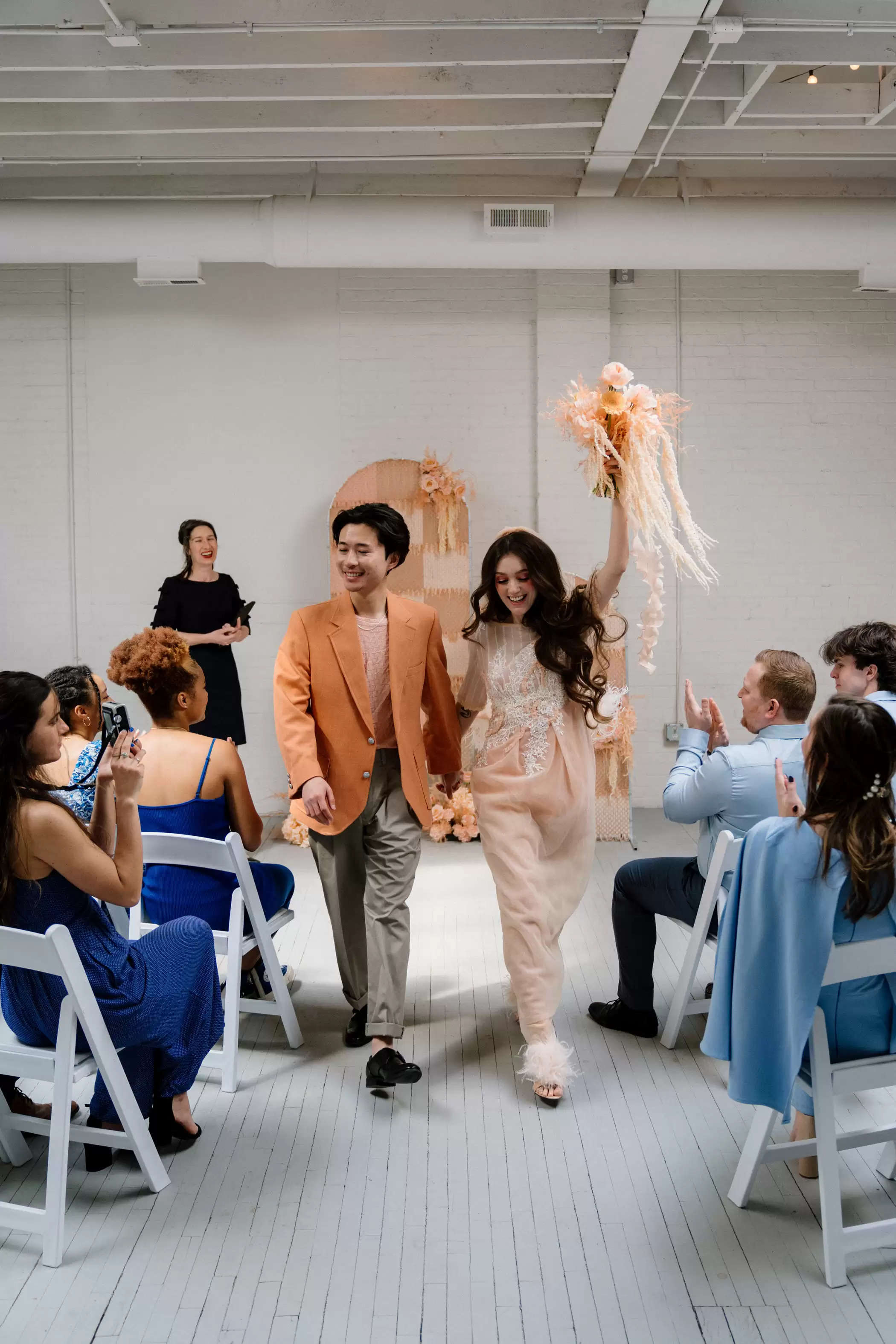 A Charming “Peach Fuzz” Impressed Warehouse Marriage ceremony with a Modern-But-Classic Vibe