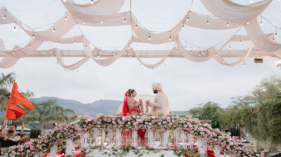 Framed by vivid decor themes and rousing revelries, this couple pledged everlasting love amidst the misty hills of Lonavala.