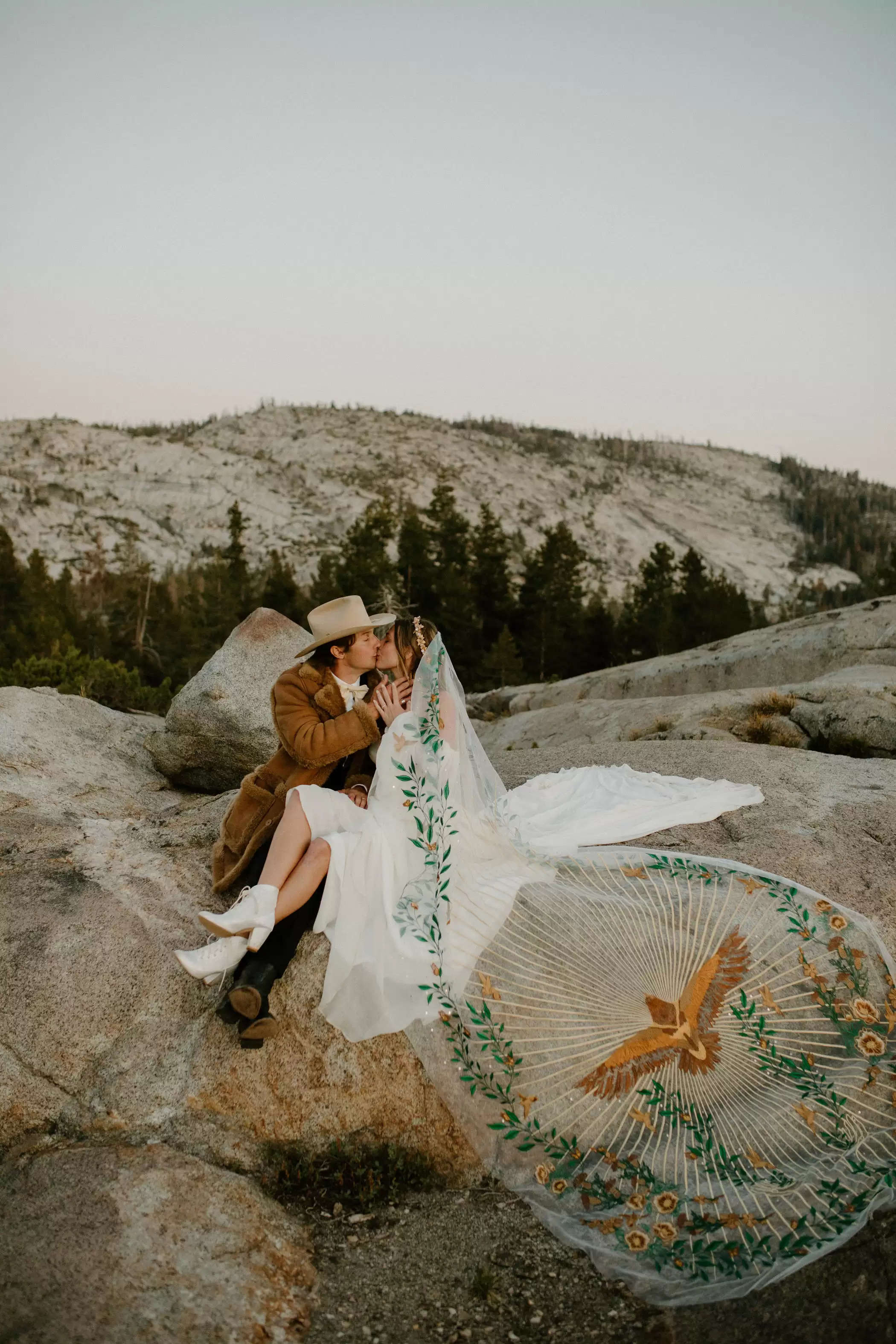 A Rustic Western Marriage ceremony within the Sierra Nevada Mountains with an Epic Embroidered Veil